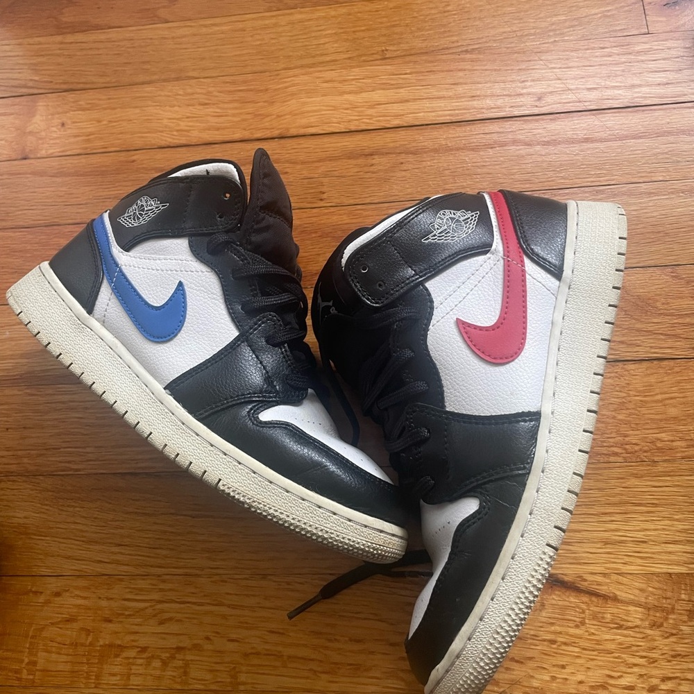 Nike High-Top Sneakers with Black, White, Blue, and Red Accents